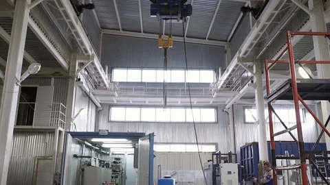 The process of managing a bridge crane in an assembly shop Stock Footage 92865034