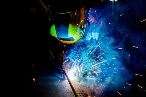A process of manual operational semi-automatic electric MIG welding with spar Stockfoto's