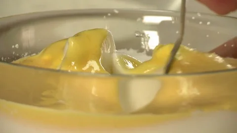 Process of manual stirring dough for dessert Stock Footage 78144860
