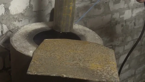 The process of manufacturing a decorative metal product. Metal sparks fly apart Stock Footage 83319533