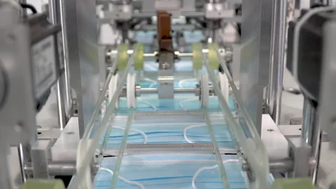 The process of manufacturing line production medical face mask with automatic Stock Footage