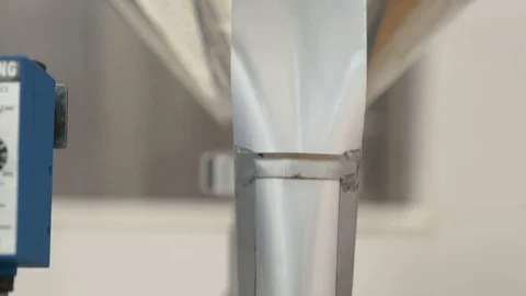 The process of manufacturing a package of mica: folding, pressing, cutting. Stock Footage 127777589