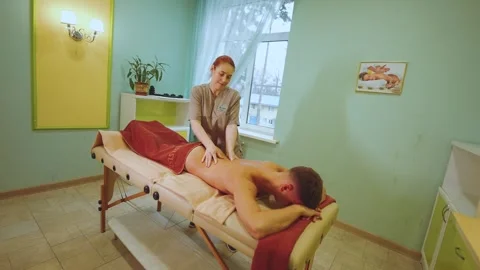 The process of a massage therapist's work, a massage therapist's office Stock Footage 321151290