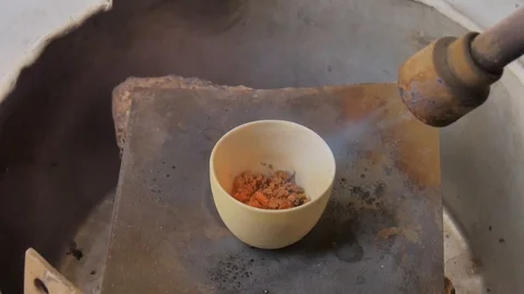 The process of melting gold in the crucible. Close-up Stock Footage