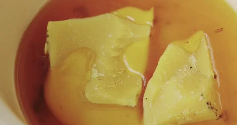 The process of melting natural beeswax Stock Footage 131211907
