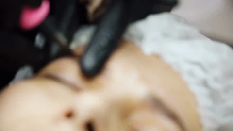 Process of microblading or permanent make-up of eyebrows. Stock Footage 104427389