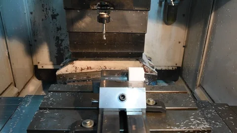 Process of milling plastic on computer numerical control by using drills Stock Footage 95697682