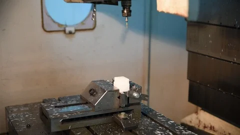 Process of milling plastic on computer numerical control by using drills Stockbeeldmateriaal 95697795