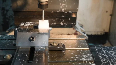 Process of milling plastic on computer numerical control by using drills Stockbeeldmateriaal 95697868