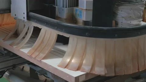 Process of milling products from glued sawdust and wood at a conveyor production Stock Footage 231978731