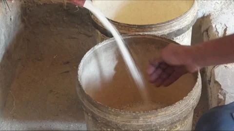 The process of milling rice into rice using a grinding machine Stock Footage 311272119