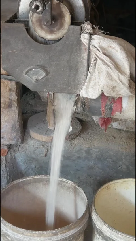 The process of milling rice into rice using a grinding machine Stock Footage 311272132