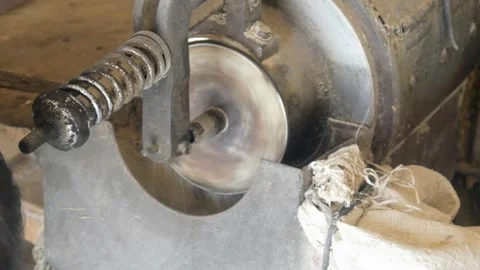 The process of milling rice into rice using a grinding machine Stock Footage 311272162