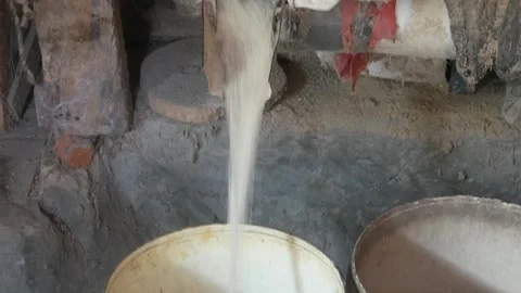 The process of milling rice into rice using a grinding machine Stock Footage 311272180