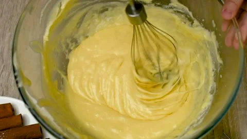 The process of mixing dough with a mixer Stock Footage 244763293