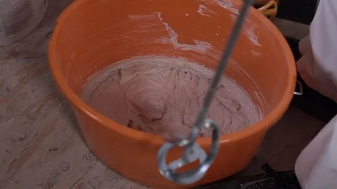 The process of mixing putty mixture for construction Stock Footage 101317226