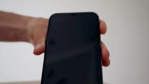 Process of mobile phone charging on an induction station pad. 4k stock footage. Vídeos de archivo 156414500