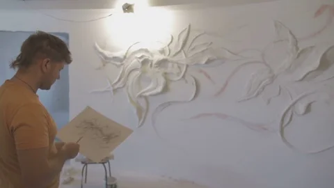 The process of molding stucco and bas-relief on the wall Video stock 73364935