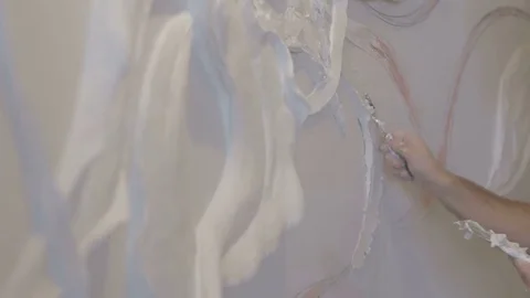 The process of molding stucco and bas-relief on the wall 库存影片 73365350