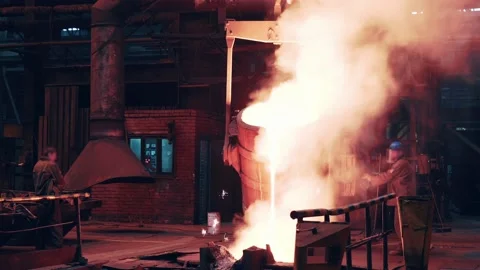 Process of molten iron pouring from blast furnace into ladle container, steel Stock Footage 153512828