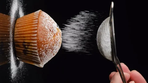 Process muffins with blueberries sprinkle with powdered sugar Видео 128693163