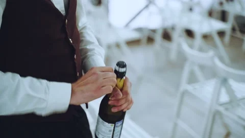 The process of opening the cork of a champagne bottle Video stock 197530271