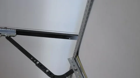 Process opening of Mechanism of garage Doors . View from Inside in garage. Close Stock Footage 334027864