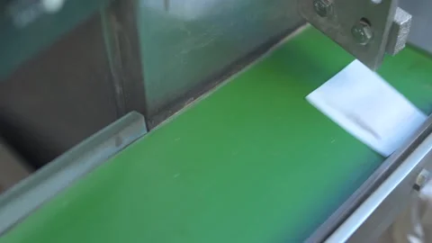 The process of packing herbal tea in the factory Stock Footage 153900069