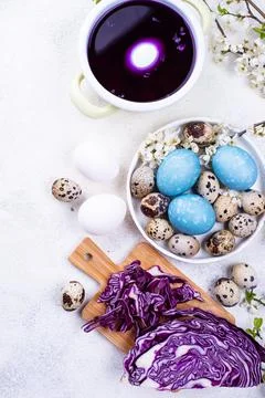 Process of painting Easter eggs in blue Stock Photos