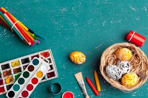 Process of painting Easter eggs. Preparing for Easter. Stock Photos
