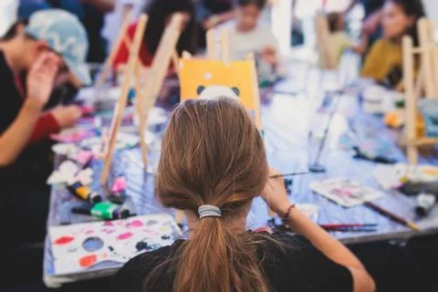 Process of painting, group class of young talented kids students with paint.. Stock Photos