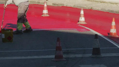 Process of painting for speed restricting road surface marking. Stock Footage 345502594