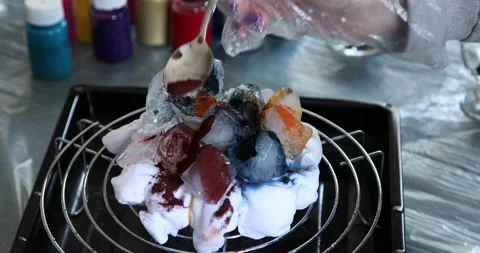 The process of painting in the style of ice dye to t-shirt 4 Stock Footage 143843644
