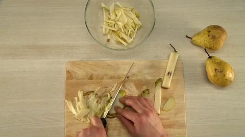 Process of pear slicing view from above Video stock 81179276