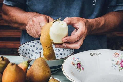 The process of peeling pears to make homemade jam Stock Photos