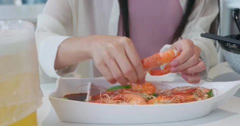 Process of peeling shrimp shells by hand Stock Footage 290832742