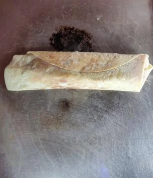 Process photo of kebabs being fried in a frying pan Foto stock