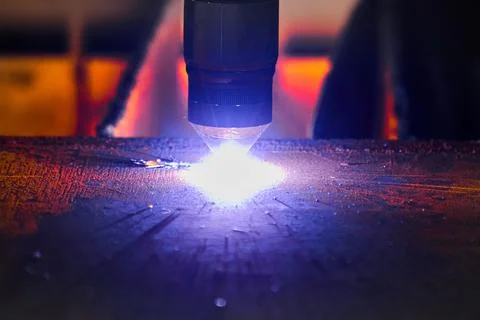 Process of plasma cutting machine tool operation in workshop Stock Photos