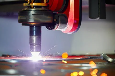 Process of plasma cutting machine tool operation in workshop Stock Photos