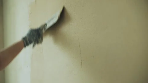 Process of plastering a wall with a spatula Stock Footage 279508775