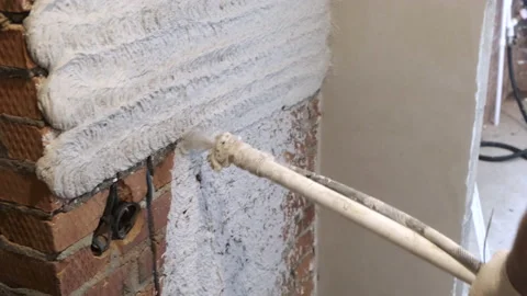 Process of Plastering Walls. Applying Layer of Building Mortar to Brick Walls Stock Footage 168355296