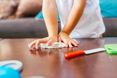 The process of play dough modeling, the child's hands sculpt figures. Play dough Stock Photos