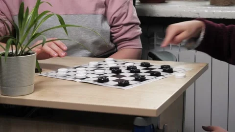 The process of playing the board game of checkers. Stock Footage 232031505