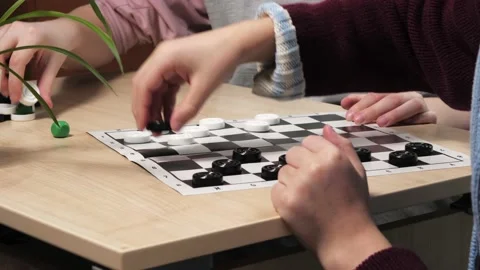 The process of playing the board game of checkers. Stock Footage 232031519