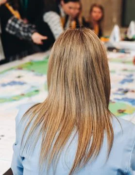 Process of playing tabletop board game on the table, fun with friends and f.. Stock Photos