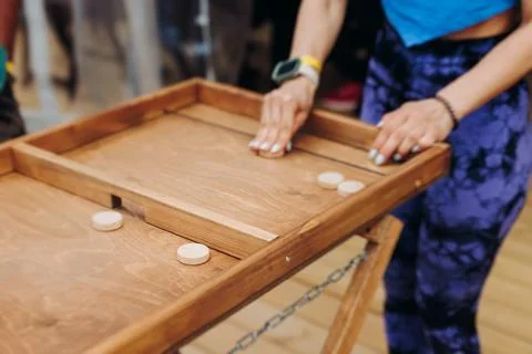 Process of playing tabletop board game on the table, fun with friends and f.. Stock Photos