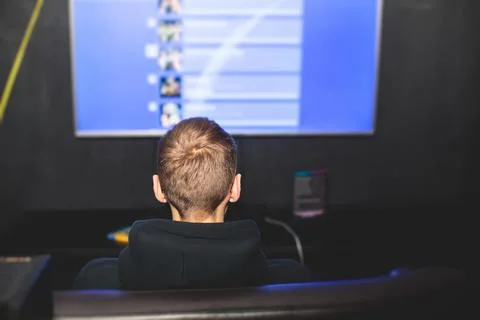 Process of playing video games, video game console with wireless controller.. Stock Photos