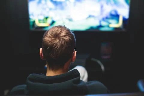 Process of playing video games, video game console with wireless controller.. Stock Photos