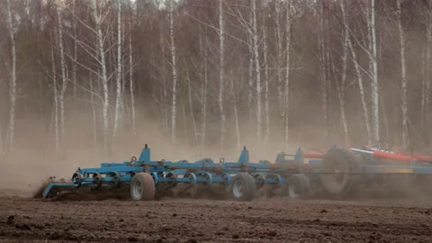 Process of plowing the soil using special equipment Stock Footage 146924634