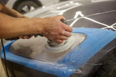 The process of polishing the headlights. Stock Photos